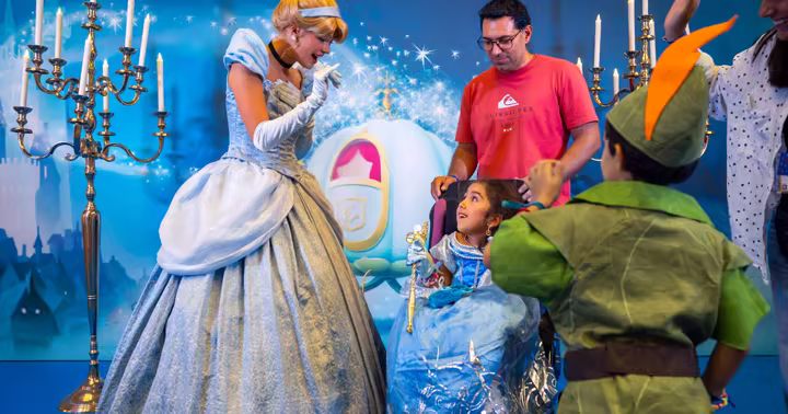 Cinderella welcomes a child during a Disneyland Paris Make-A-Wish visit