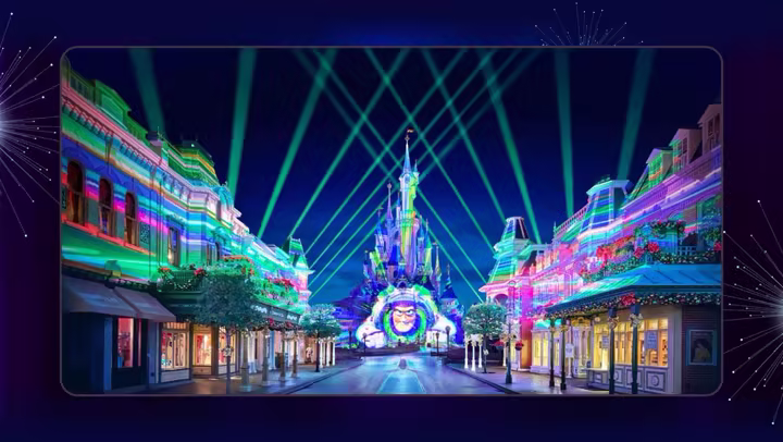 Disney Tales of Magic projections and beams lighting Sleeping Beauty Castle and Main Street at Disneyland Paris