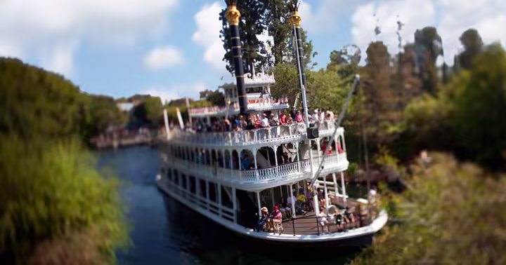 The Mark Twain Riverboat traveling on the Rivers of America at Disneyland Park