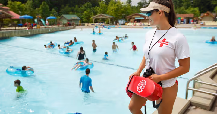 Guests in the Mountain Waves wave pool at Dollywood's Splash Country