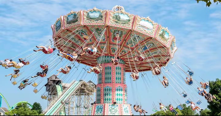 Guests riding the historic Zephyr-style swing ride at Dorney Park