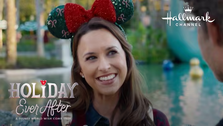 Lacey Chabert wears holiday Minnie ears in an official Hallmark Channel sneak peek for Holiday Ever After: A Disney World Wish Come True