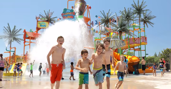 Kids play at Splash Water Island in an official Hurricane Harbor Concord image