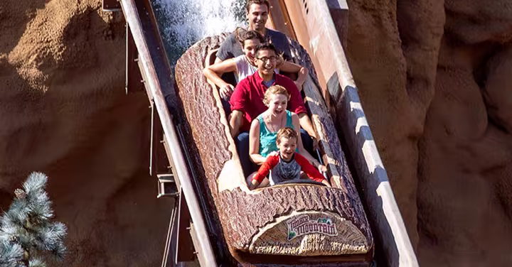 Guests ride Timber Mountain Log Ride at Knott's Berry Farm