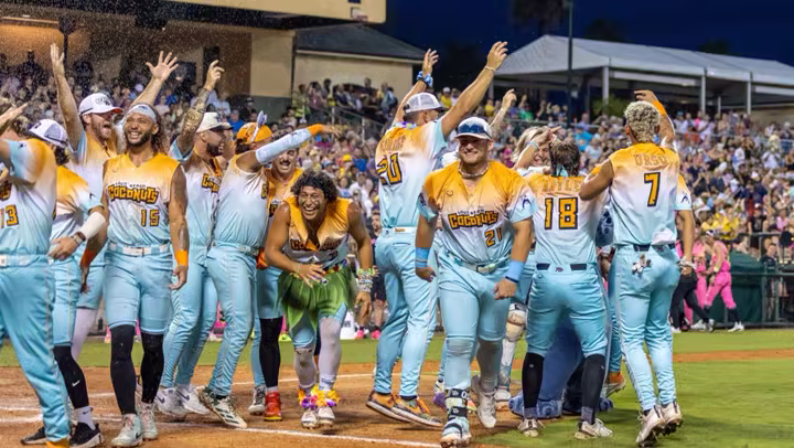 Loco Beach Coconuts players celebrate a walkoff win at ESPN Wide World of Sports