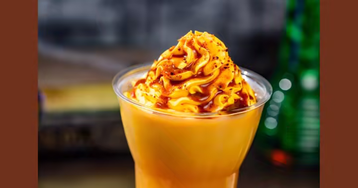 A mango DOLE Whip float served at Aloha Isle in Magic Kingdom