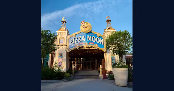 The theater-themed entrance to Pizza Moon at Universal Epic Universe