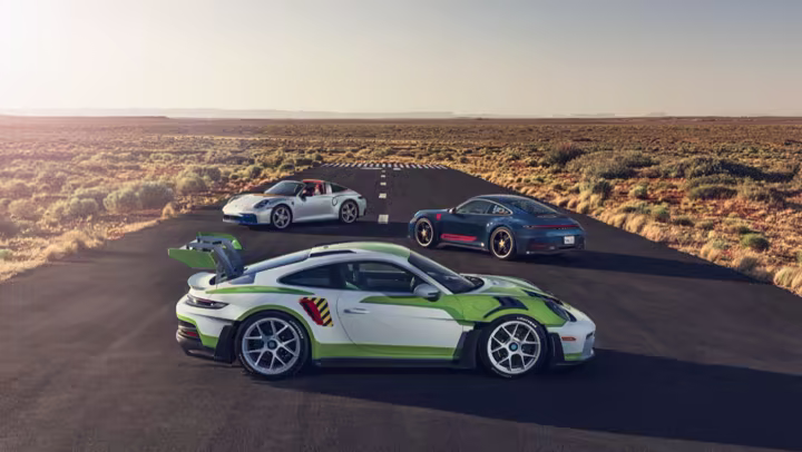 Three Porsche 911 models inspired by Woody, Buzz Lightyear, and Jessie for Toy Story 5
