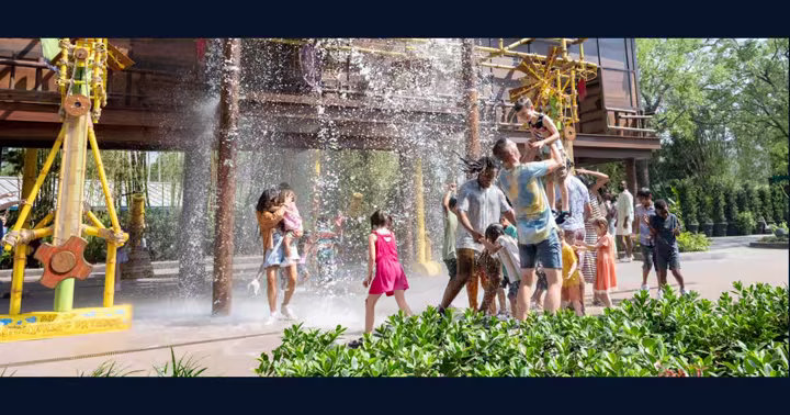 Families play under water features at Po's Kung Fu Training Camp in DreamWorks Land at Universal Studios Florida