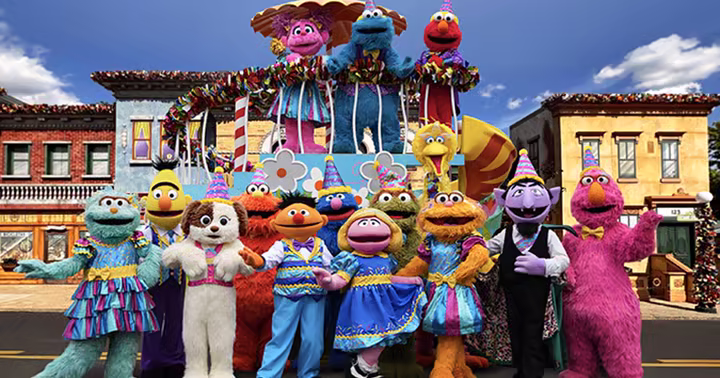 Sesame Street characters wearing birthday outfits at Sesame Place Philadelphia