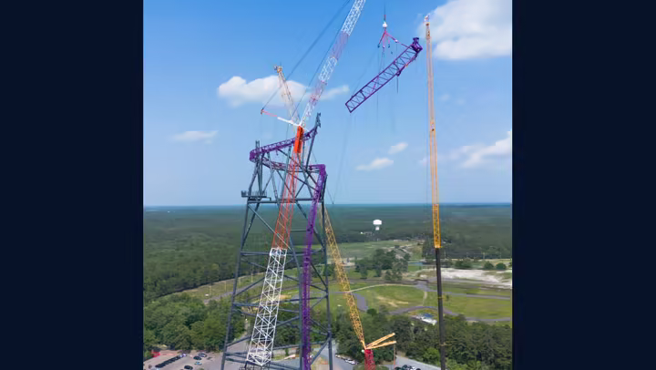 Purple Project Purple coaster track and construction cranes at Six Flags Great Adventure