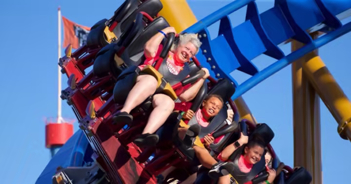 Guests ride a roller coaster at Six Flags Great America