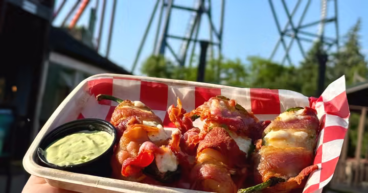 Bacon-wrapped peppers served in front of roller coasters at Six Flags Great America