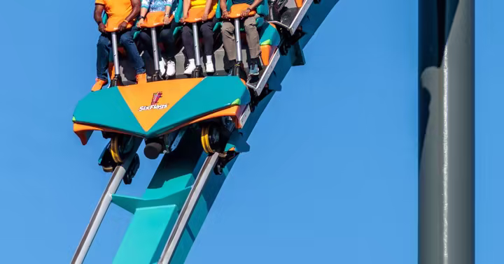 Six Flags Over Georgia coaster train on a blue track
