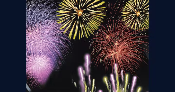 Fireworks burst over Universal Orlando Resort during a nighttime celebration