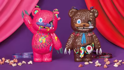 Pink HamiKuma Candy and brown HamiKuma popcorn buckets, shown side by side.