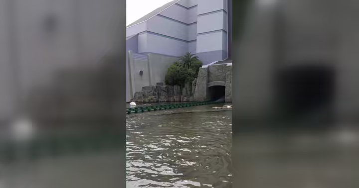 Jurassic Park - The Ride boat entering a water curtain at Universal Studios Japan