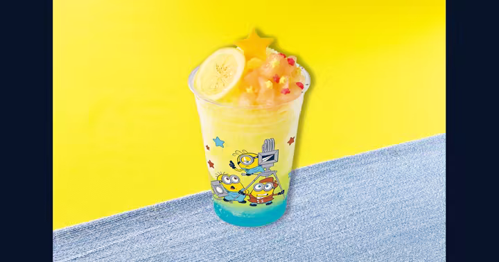 Movie Star Minion Frappe with peach, lemon, stars, and Minions film-camera artwork
