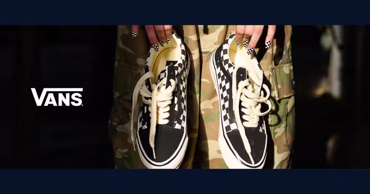 Vans checkerboard shoes and logo from the official Vans Disney Springs store page