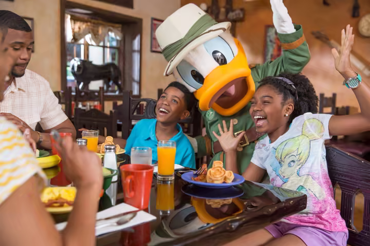 Walt Disney World dining plan meal, dessert, and resort mug in an official Disney Parks image