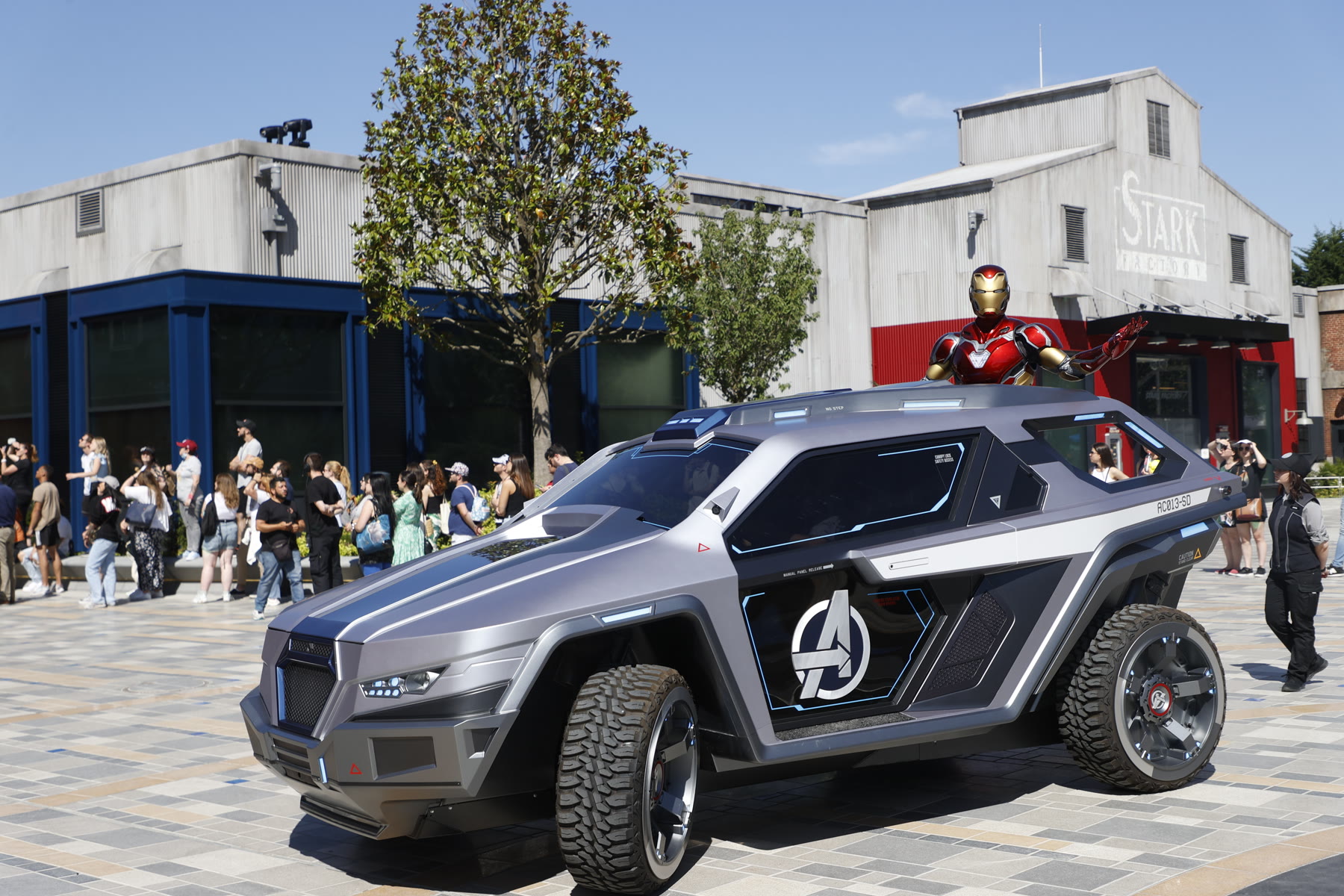 Iron Man rides through Marvel Avengers Campus at Disneyland Paris in an Avengers vehicle
