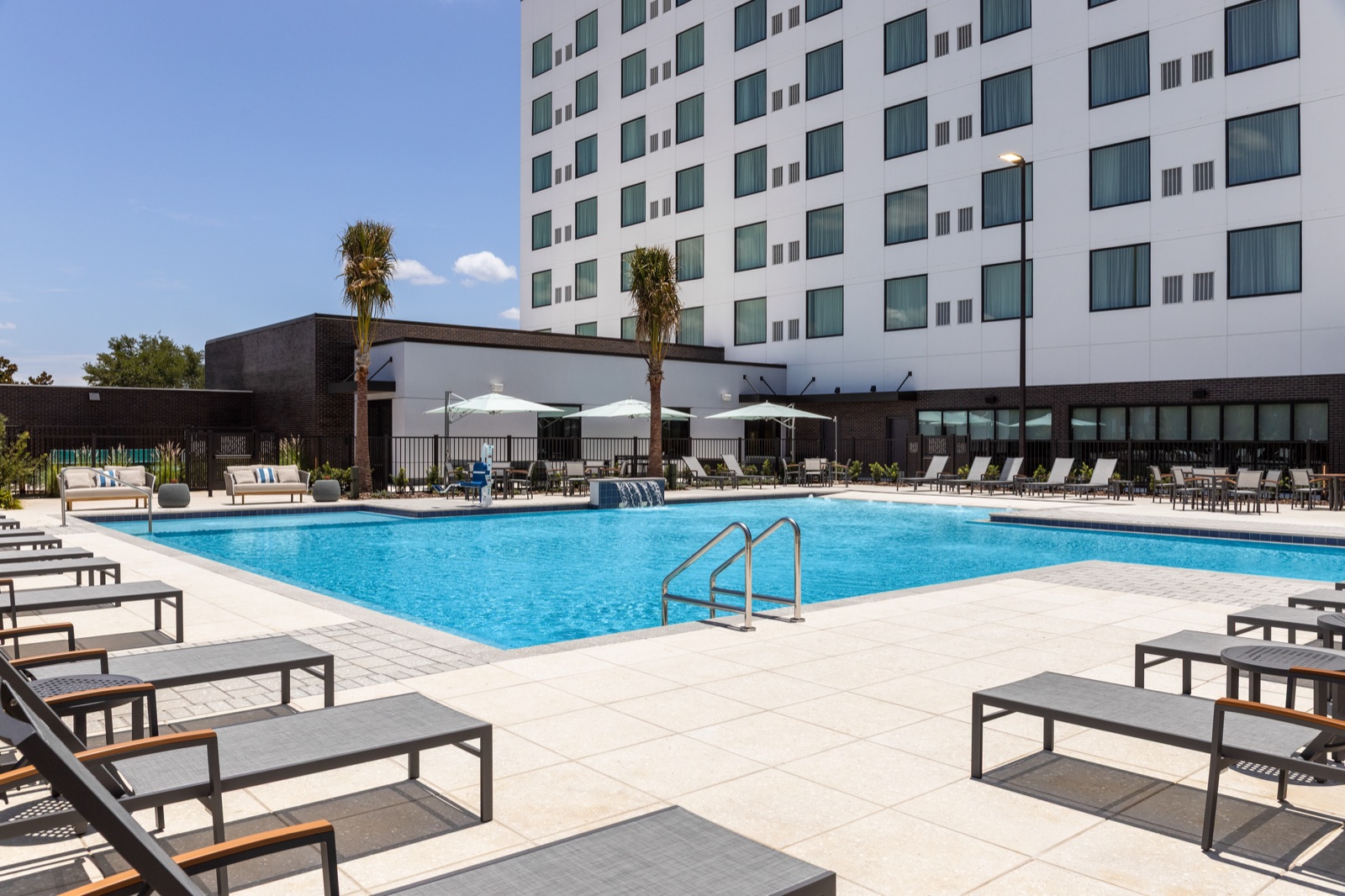 Outdoor pool at the dual-branded EVEN Hotel and Staybridge Suites near Universal Orlando