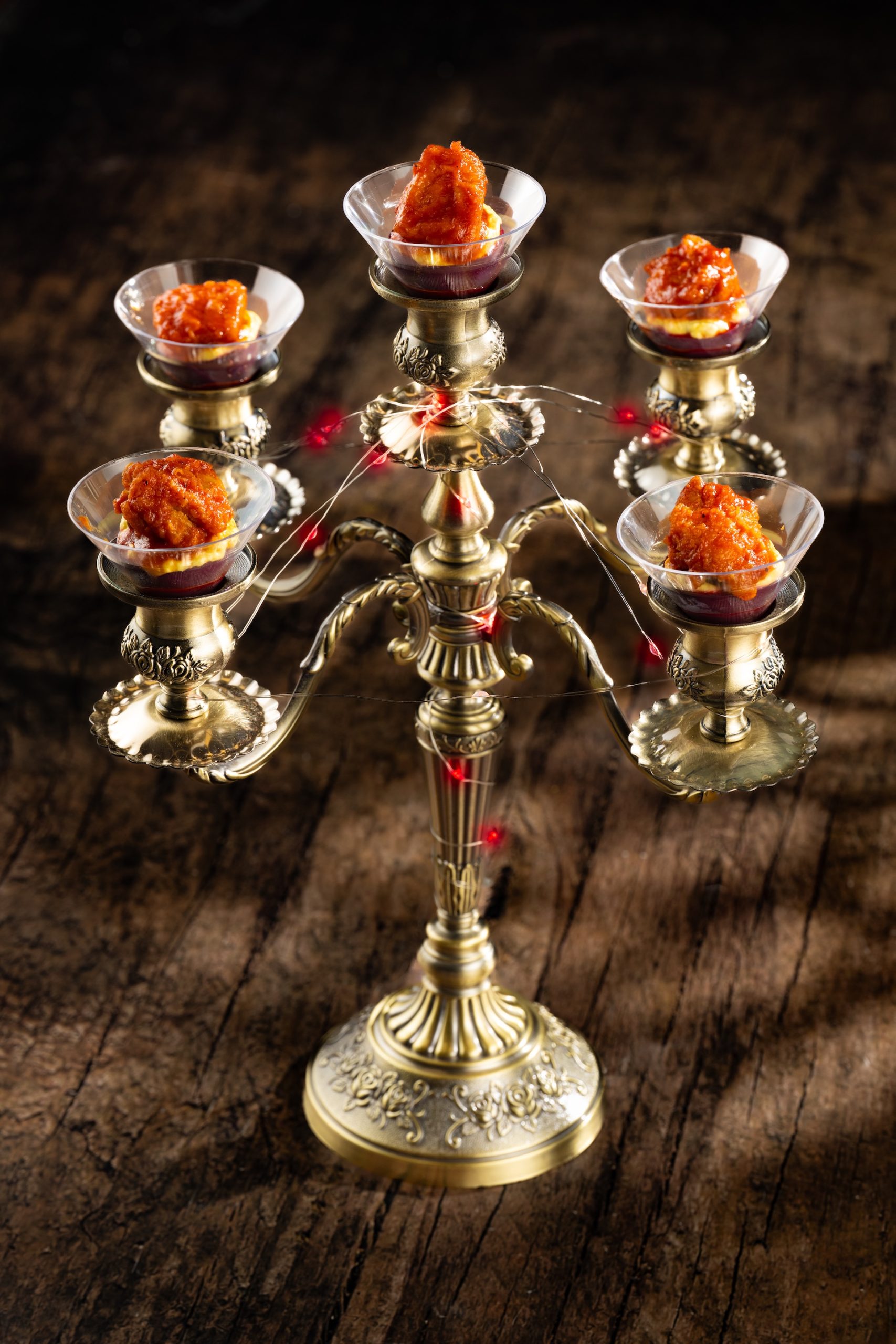Candelabra Eggs with fried chicken and pepper sauce