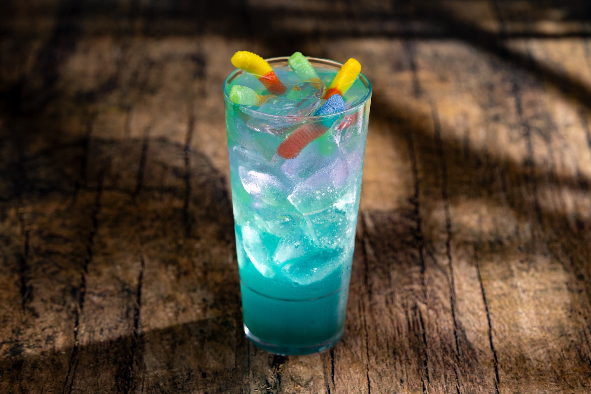 Green Viper’s Nest drink with juice-filled pearls and gummy candy