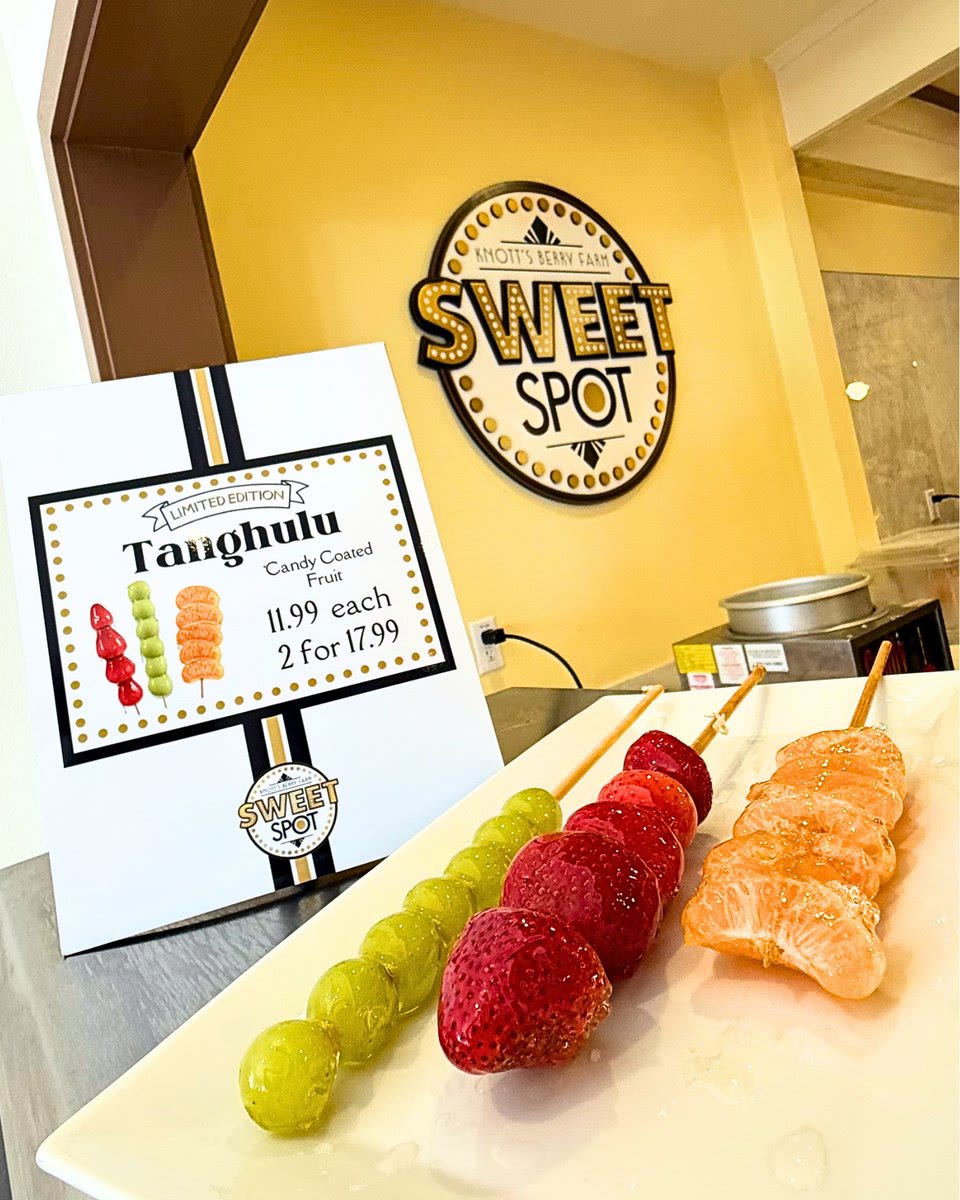 Tanghulu skewers and price sign inside Sweet Spot at Knott's Berry Farm