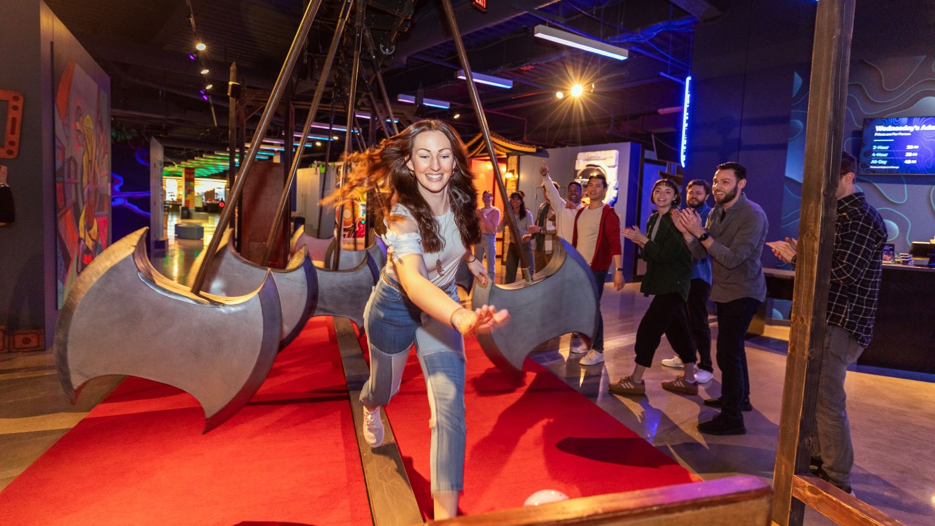 Guests play an axe-dodging game inside Level99 at Disney Springs