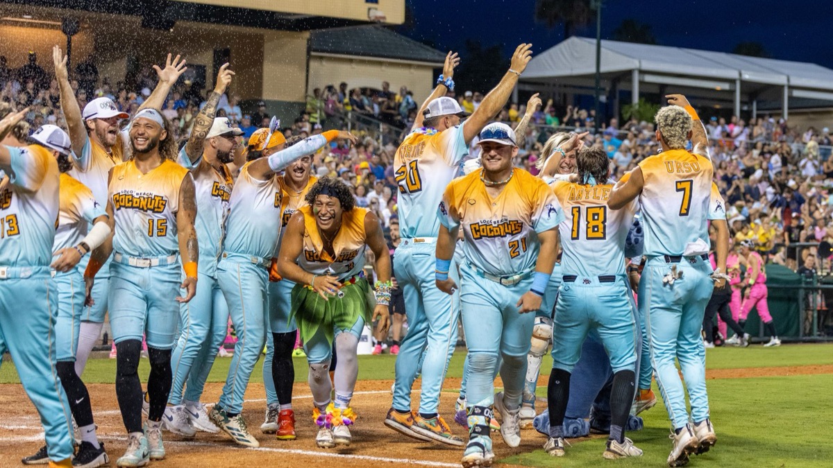 Loco Beach Coconuts players celebrate a walkoff win at ESPN Wide World of Sports