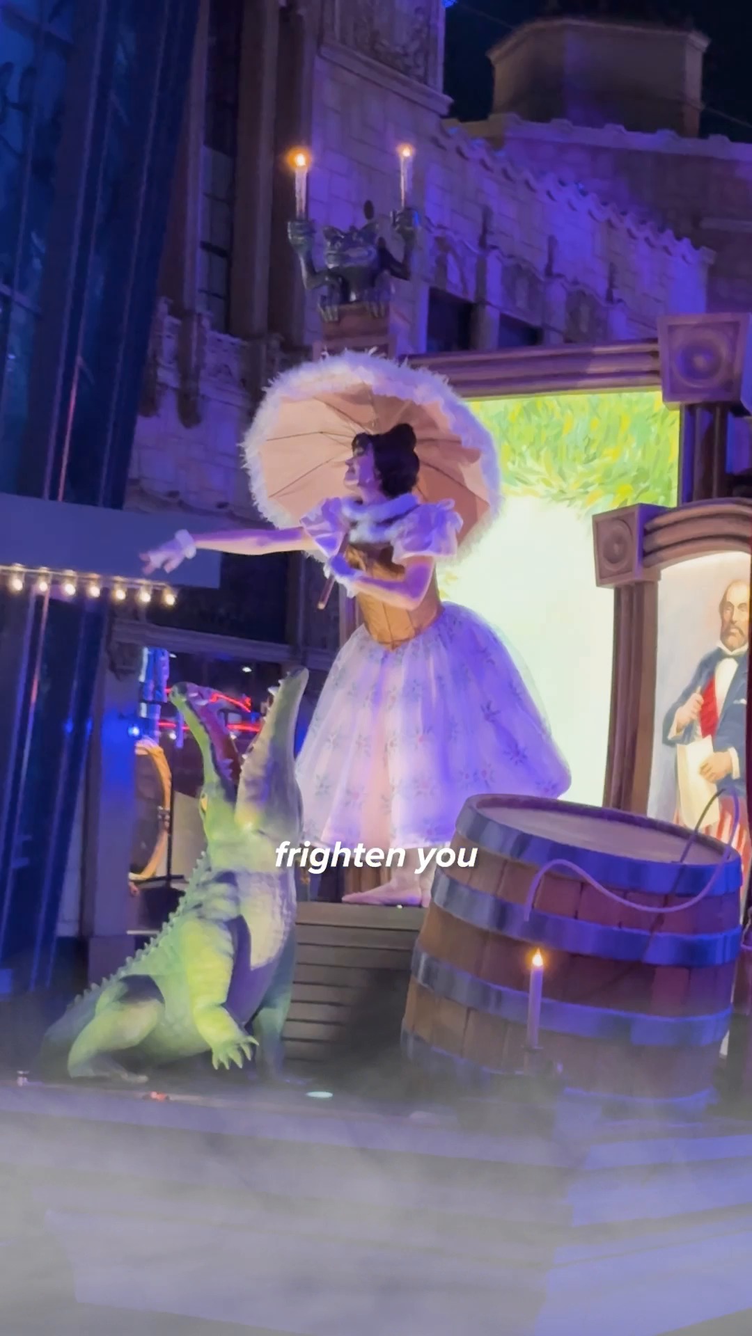 A ghostly dancer performs beside the séance set for Madame Leota's Swinging Wake