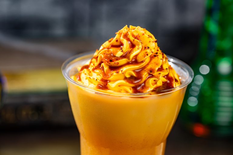 A mango DOLE Whip float served at Aloha Isle in Magic Kingdom
