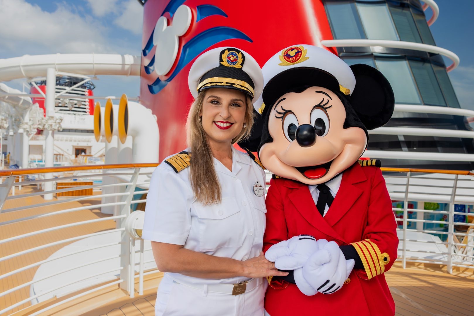 Captain Maria Gotor with Captain Minnie aboard the Disney Wish