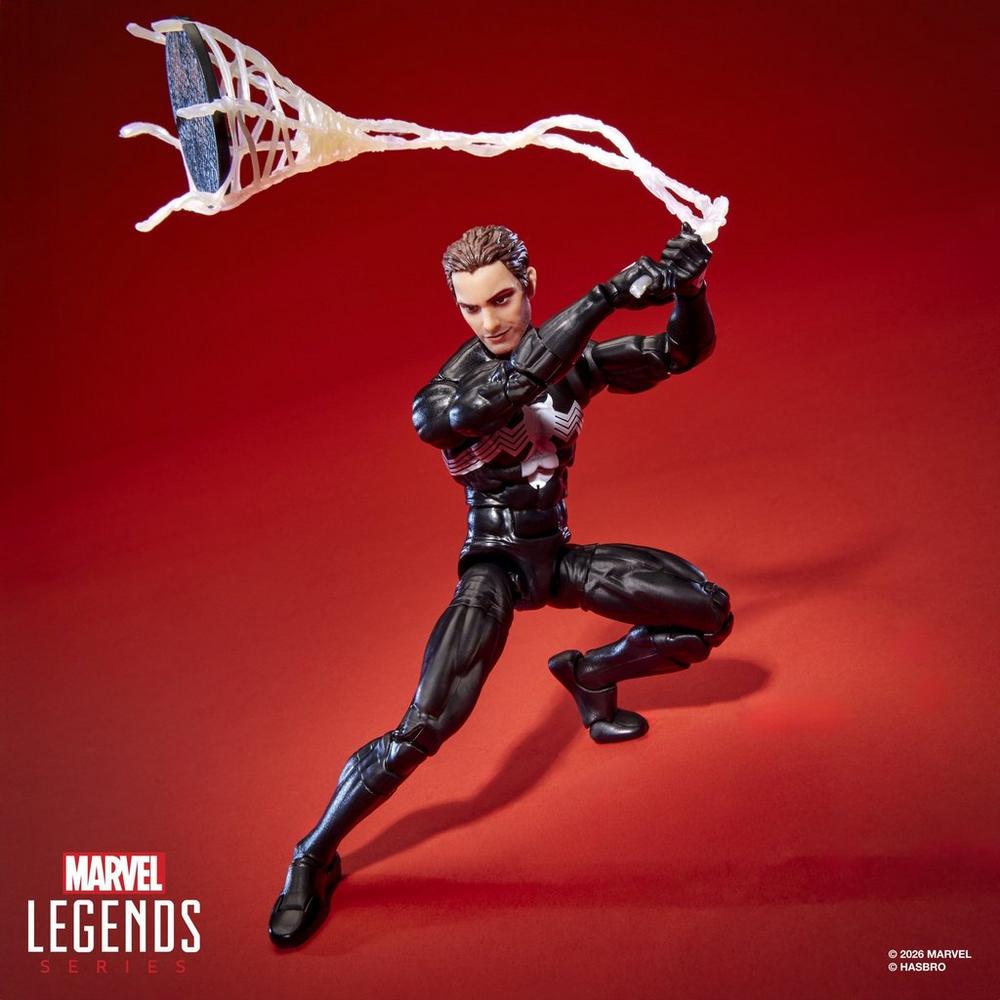 Unmasked Peter Parker figure swinging a web snare