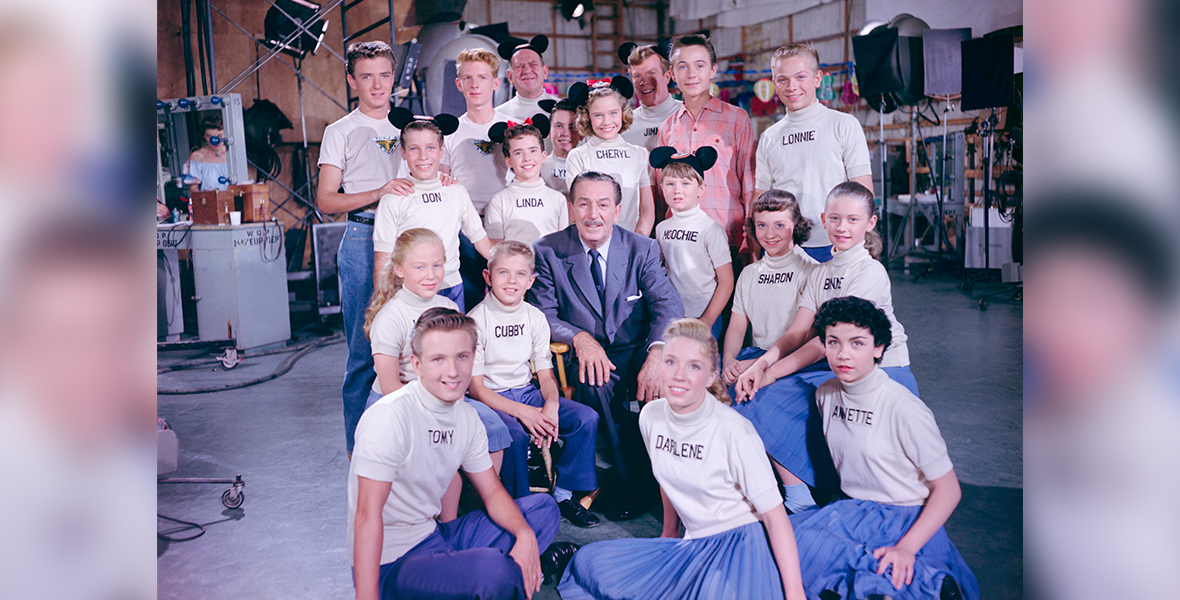 Walt Disney poses with the original Mickey Mouse Club cast