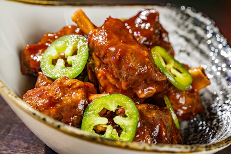 Bowl of Bones: Pork wings fried with jalapeños and tossed in barbecue sauce made with Coca-Cola Cherry (Available during Mickey’s Not-So-Scary Halloween Party only)
