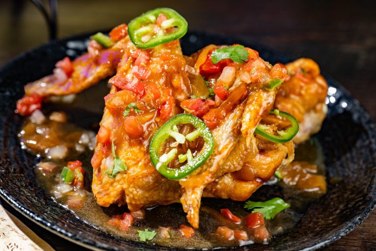 Buzzard Wings: Whole chicken wings tossed with grilled onions, jalapeños, and lime (Available during Mickey’s Not-So-Scary Halloween Party only)