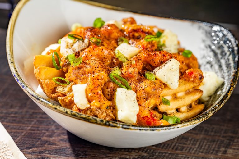 Cajun Crawfish and Sausage BOOtine: Waffle fries topped with cheese curds and Cajun crawfish-andouille sausage gravy (Available during Mickey’s Not-So-Scary Halloween Party only)