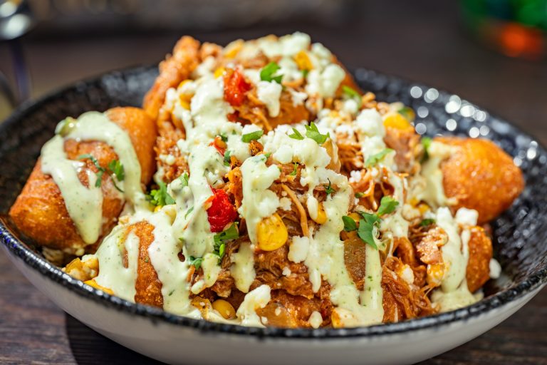 Chipotle Barbecue Pork and Street Corn Mini Corn Dogs: Mini corn dogs topped with fire-roasted corn, queso fresco, jalapeño ranch, and cilantro (Available during Mickey’s Not-So-Scary Halloween Party only)