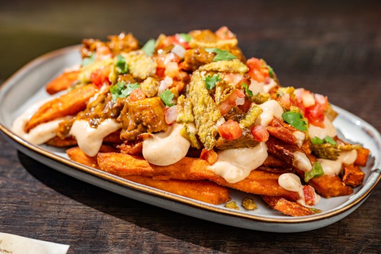 Cursed Cowboy Fries: Sweet potato fries topped with barbecue burnt ends, chipotle queso, pico de gallo, and crispy jalapeños (New) (Available during Mickey’s Not-So-Scary Halloween Party only)