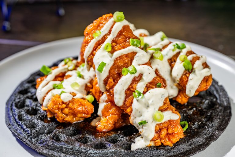 Graveyard Hot Chicken and Waffle: Nashville hot chicken strips, blue cornmeal waffle, and pickle ranch (New) (Available during Mickey’s Not-So-Scary Halloween Party only)