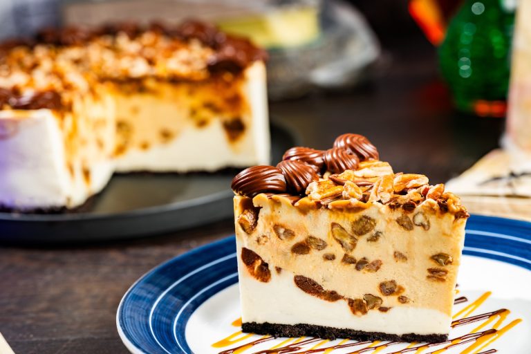Phantom Pecan-Caramel Cheesecake: Layers of New York and caramel cheesecake with dulce de leche, chocolate ganache, and pecans on a chocolate crust (New) (Available during regular park hours and Mickey’s Not-So-Scary Halloween Party; reservations recommended)