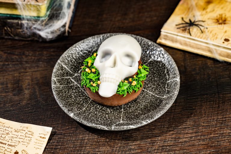 Skull-icious Cake: Chocolate cake, chocolate mousse and peanut butter buttercream with chocolate popping candies and a chocolate cookie crust (New) (Available during Mickey’s Not-So-Scary Halloween Party only)
