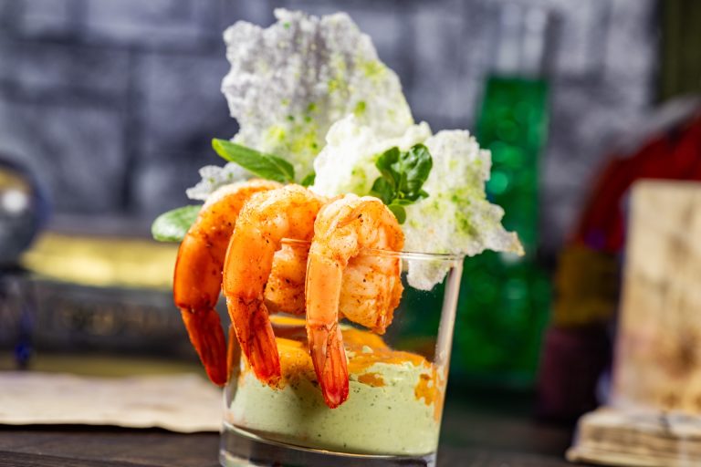 Supernatural Shrimp: Avocado mousse, tomato horseradish sauce, rice cracker, and wasabi peas