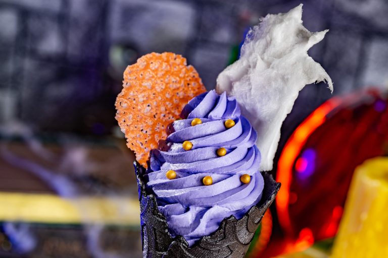 Ursula Cone: Wild berry soft-serve with candy coral and citrus cotton candy in a black vanilla cone (Available during Mickey’s Not-So-Scary Halloween Party only)