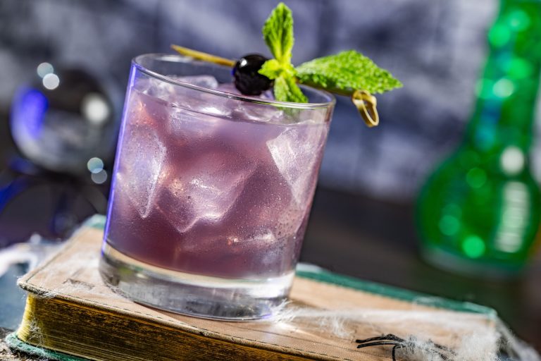Violet Specter: Tito’s Handmade Vodka, Chambord Liqueur, lemon juice, and Sprite, garnished with mint and a Luxardo cherry