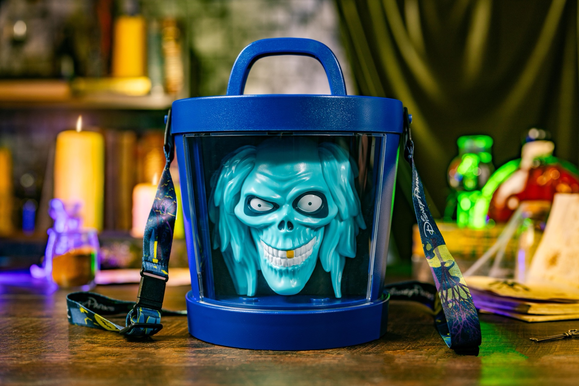 Hatbox Ghost face inside a blue lantern-style bucket