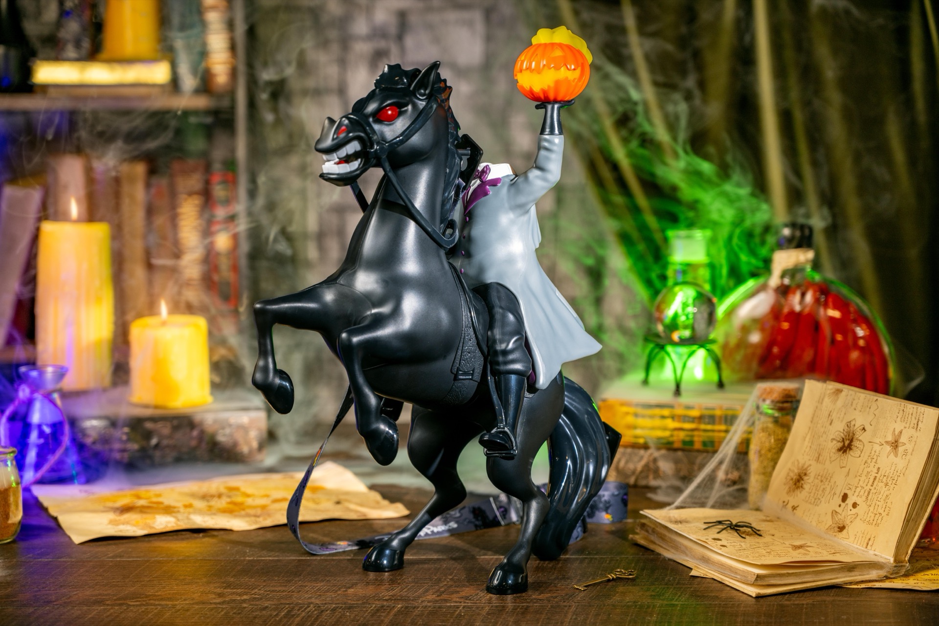 Headless Horseman bucket with a glowing jack-o’-lantern in his raised hand