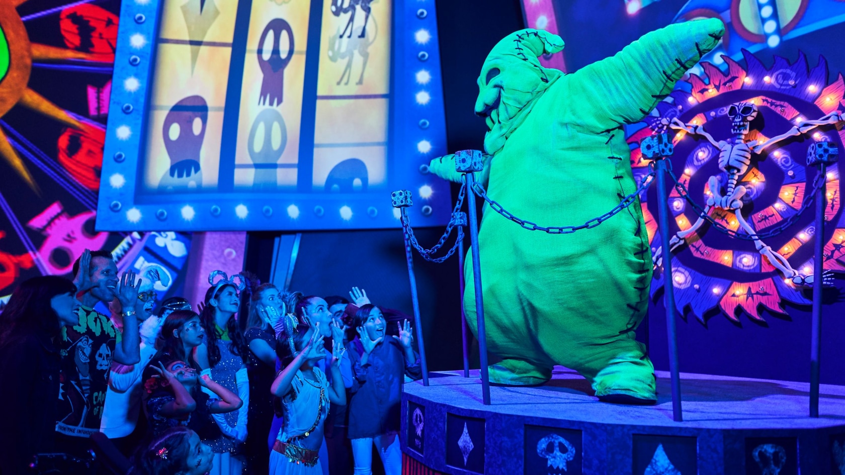 Guests collect candy at Treat Trails during Oogie Boogie Bash